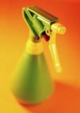 A green spray bottle.